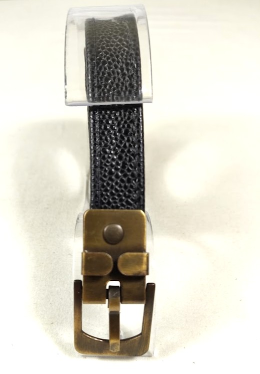Ceinture pour Elle, en cuir noir grain&eacute; et boucle coloris bronze vieilli.