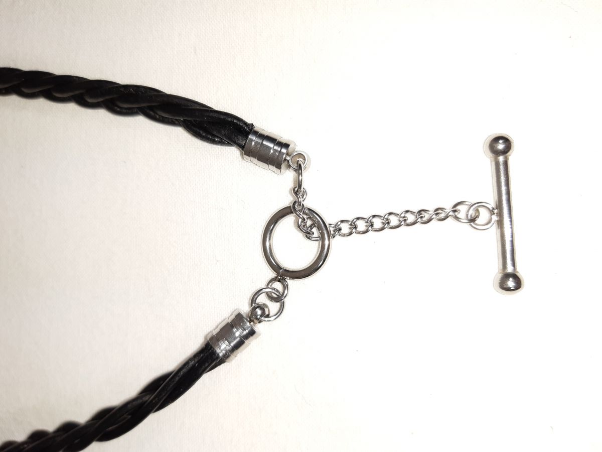 Valentine's Day! Braided leather necklace and antique silver metal pendant.