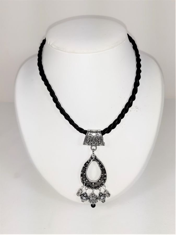 Valentine's Day! Braided leather necklace and antique silver metal pendant.