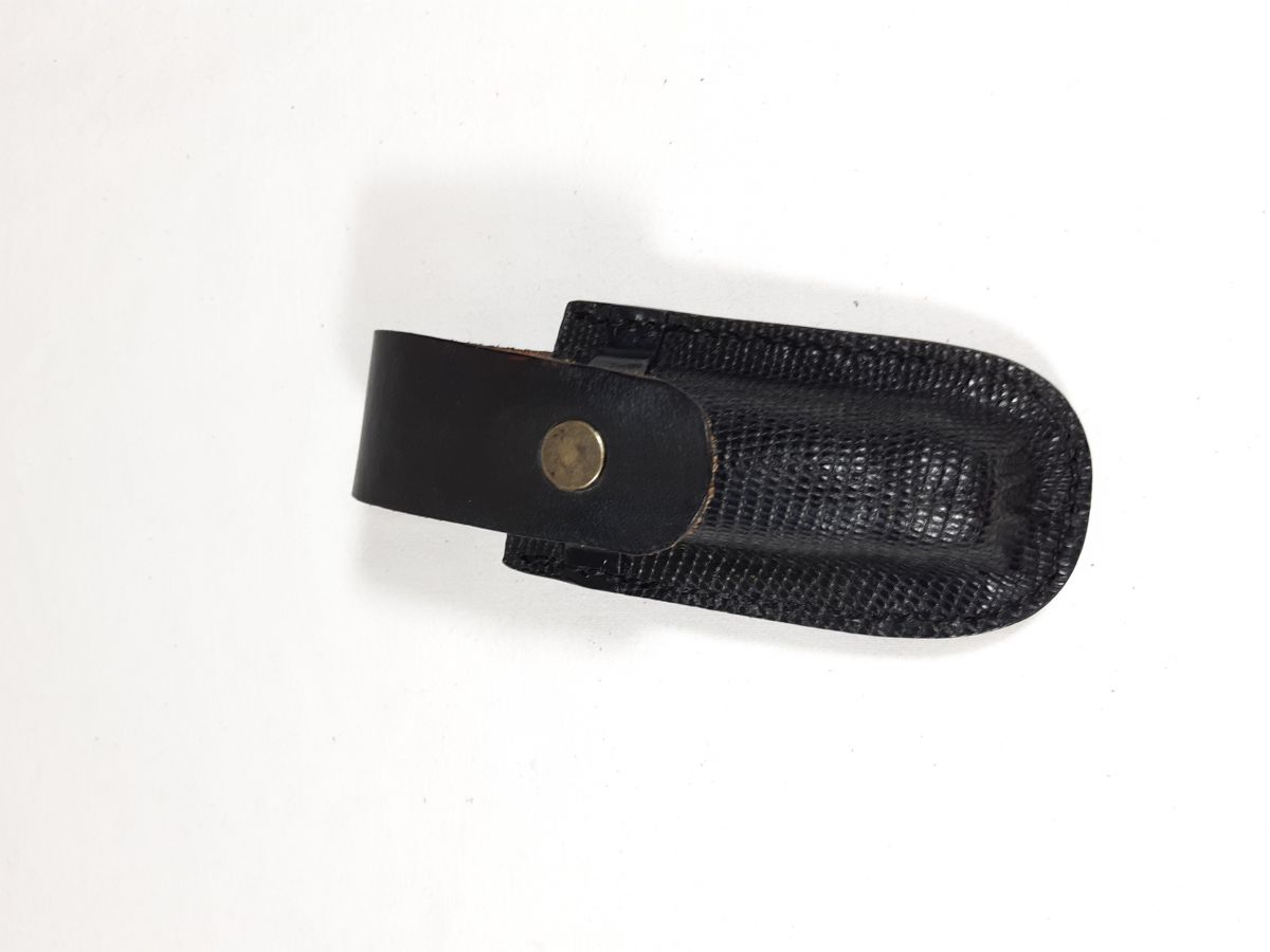 Knife sheath in vegetable tanned leather, hand sewn