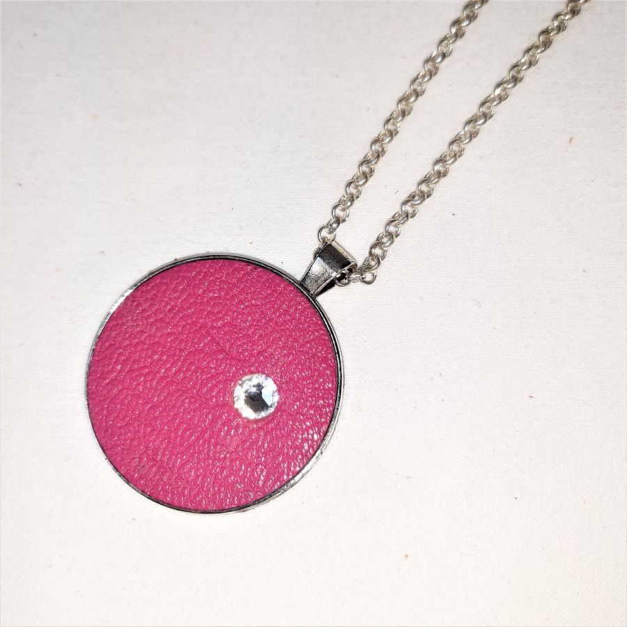 Leather and swaroski crystal medallion in fushia pink