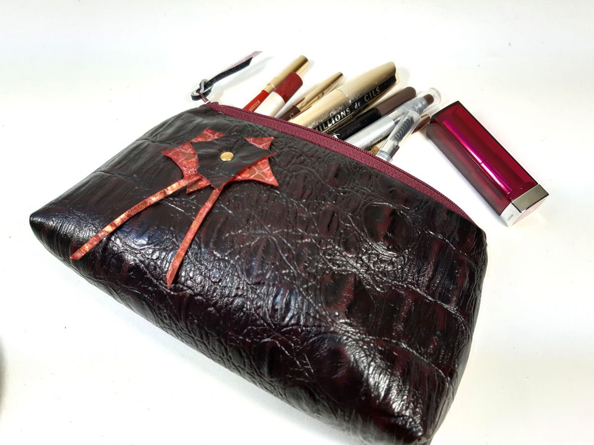 Makeup bag crocodile style leather.