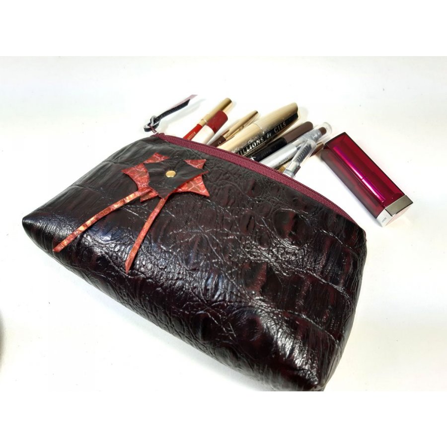 Makeup bag crocodile style leather.