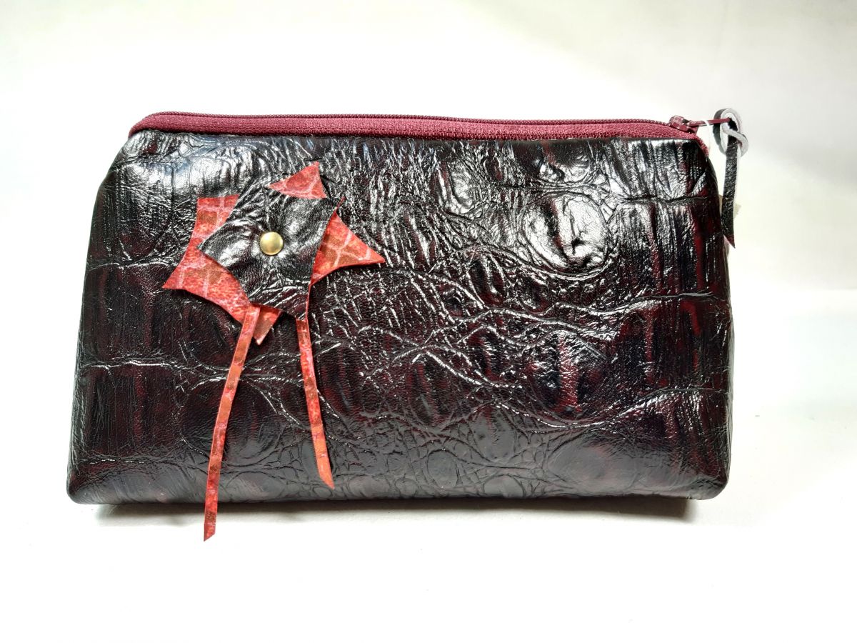 Makeup bag crocodile style leather.